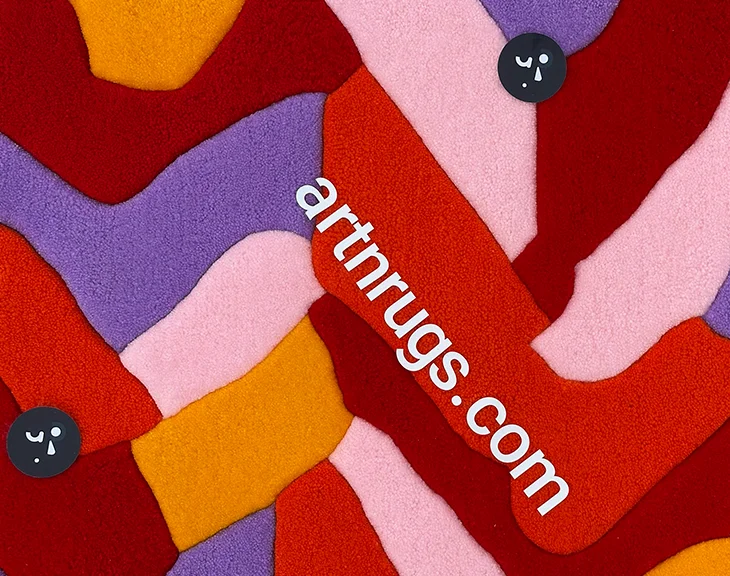 Détail coloré de blocs imbriqués sur le Tapis Parquet Rouge et Orange